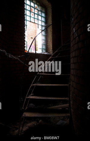 Old abandoned factory with metal staircase in Potsdam Berlin Stock Photo