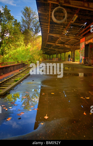 An old S-Bahn station unused since the 80s near Berlin with reflections in water