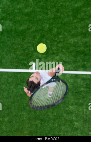Man playing tennis Stock Photo