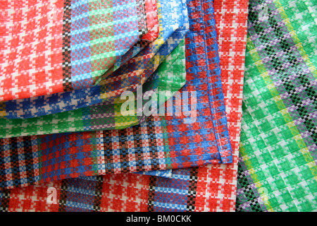 A selection of colourful plastic bags in a market in Arequipa, Peru Stock Photo