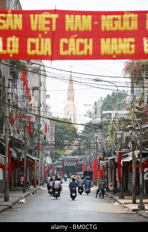 political banner and Vietnamese flags New Year festival, Tet, in a street, Cholon quarter, Saigon, Vietnam, Vietnam, Asia Stock Photo