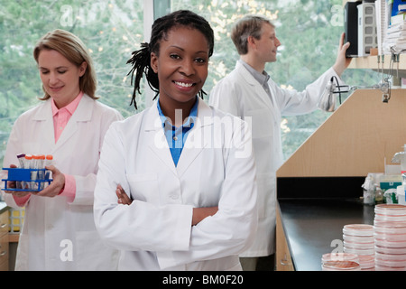 Three doctors working in a laboratory Stock Photo