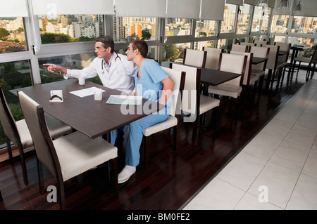 Doctors during coffee break a cafeteria Stock Photo