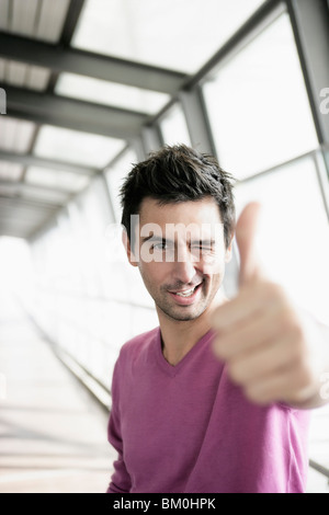 Man giving thumb up Stock Photo