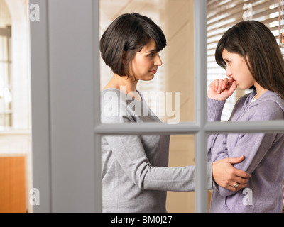 Mother and daughter having a talk Stock Photo