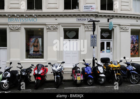 Scooters Parked outside Bravissimo, Burleigh Street, Westminster, London, England, UK Stock Photo