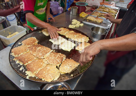 Malaysia, Mamak street vendor making murtabak in a Pasar Malam Stock Photo