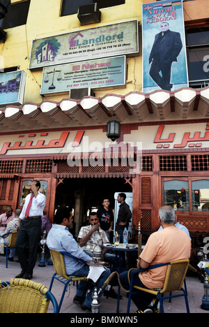 Egyptian men smoking hookahs in a cafe in Hurghada Stock Photo