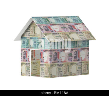 Close-up of a model house made from Indian currency Stock Photo