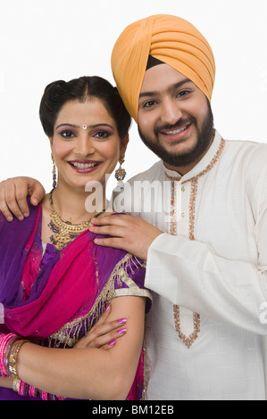 Portrait of a Sikh couple smiling Stock Photo