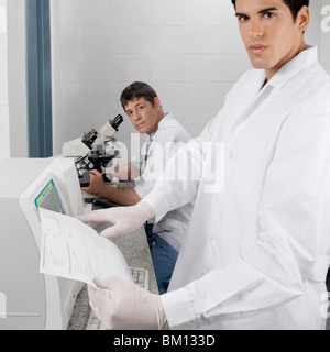 Two researchers working in a laboratory Stock Photo