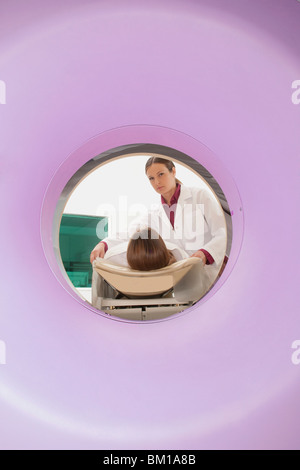 Patient going through an MRI scan Stock Photo