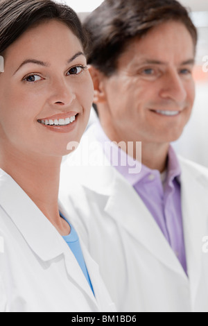 Close-up of two doctors smiling in a laboratory Stock Photo
