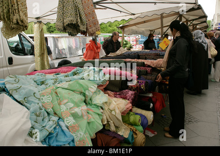 Fabric at the Turkish market at Maybachufer in eastern Kreuzberg, Berlin, Germany Stock Photo