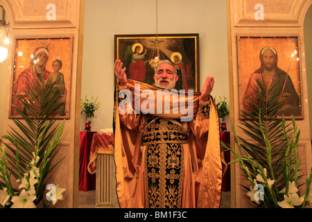 Israel, Nazareth, Abouna Emile Shoufani at the Greek Catholic Church on Palm Sunday Stock Photo