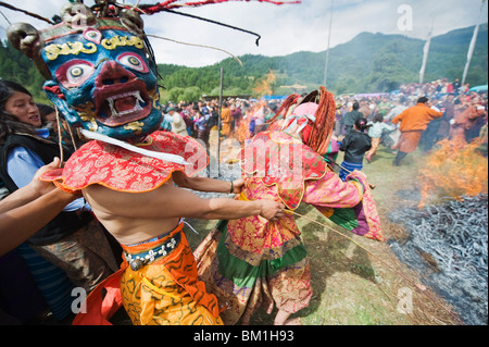 Dancers in costume at Thangbi Mani Tsechu (festival), Jakar, Bumthang, Chokor Valley, Bhutan, Asia Stock Photo