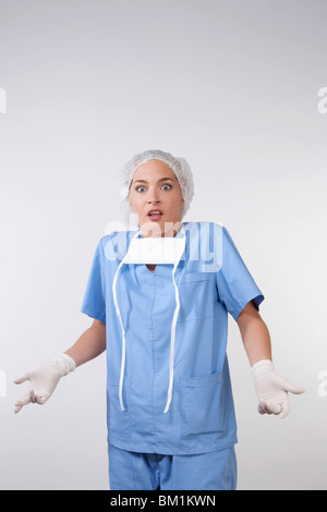 Portrait of a female surgeon gesturing Stock Photo