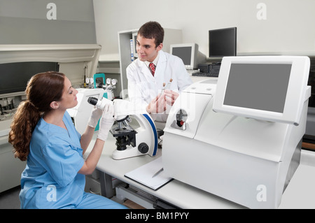 Lab technicians working in a laboratory Stock Photo