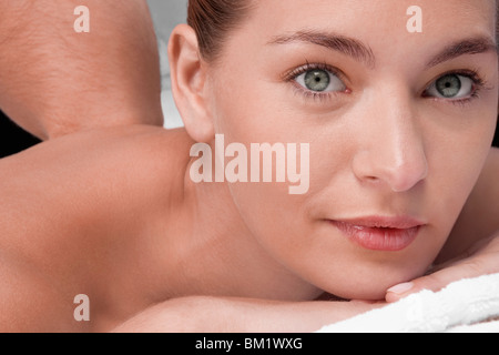 Woman receiving back massage