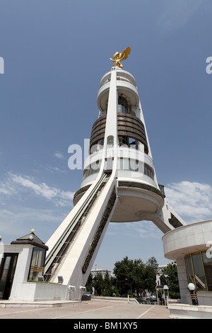 The Neutrality Arch with a golden statue of Saparmyrat Niyazov Turkmenbashi on top in Ashgabat, Turkmenistan. Stock Photo