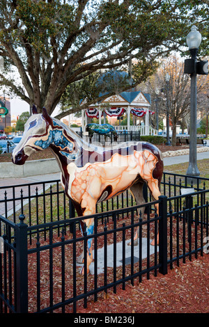 Ocala, FL - Mar 2009 - Painted horse sculptures and gazebo with bunting decorate the downtown square in Ocala, Florida Stock Photo