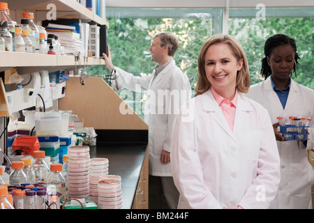 Three doctors working in a laboratory Stock Photo