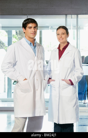 Portrait of two doctors standing together and smiling Stock Photo