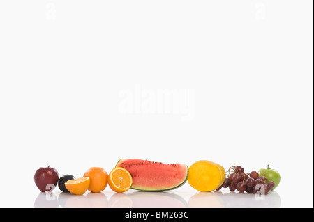 Assorted fresh fruits in a row