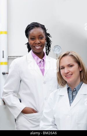 Portrait of two female doctors smiling in a laboratory Stock Photo