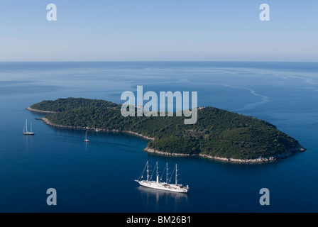 Yacht sailing round the island of Lokrum, part of the Elaphite Islands, near Dubrovnik, Croatia, Europe Stock Photo