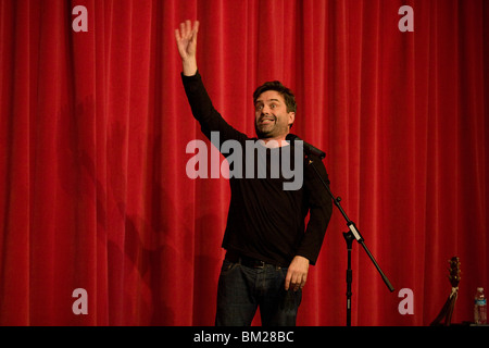 The stand-up comedian Phil Nichol performs on stage in London. Stock Photo