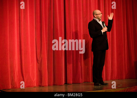 The stand-up comedian Chris Neill performs on stage in London. Stock Photo