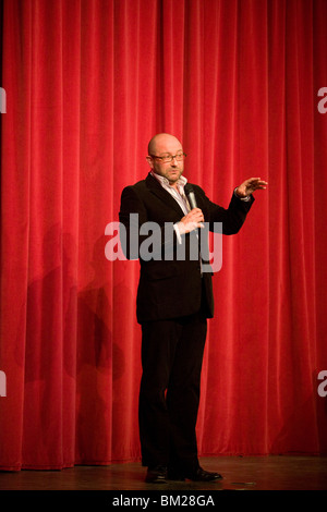 The stand-up comedian Chris Neill performs on stage in London. Stock Photo