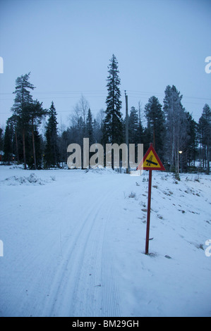 Snow covered road, Pyha-Luosto ski resort, Finnish Lapland, Finland, Scandinavia Stock Photo