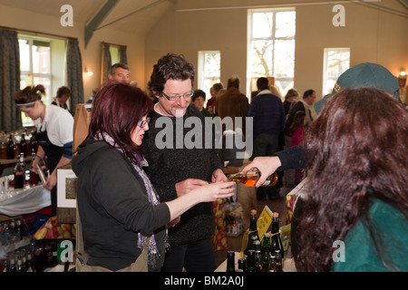 UK, England, Herefordshire, Putley, Big Apple Event, visitors sampling cider and perry competition entries Stock Photo