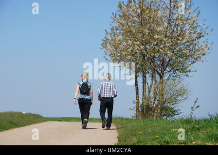 walking along country lanes in Haspengouw Belgium Stock Photo