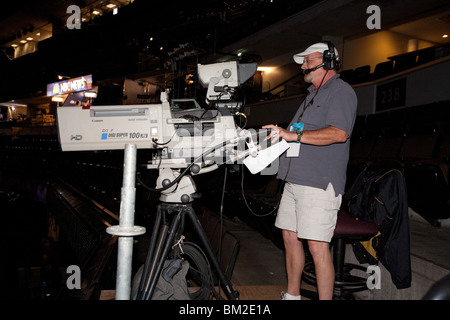 Cameraman and HD Camera (Side) Stock Photo