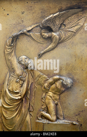 Depiction of Abraham sacrificing Isaac, Gate of Paradise door of the Baptistry of San Giovanni, Florence, Italy Stock Photo