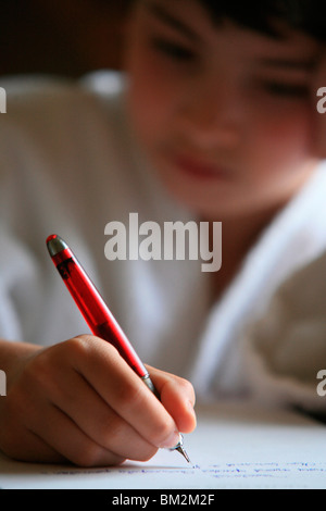 Boy writing a letter, France Stock Photo