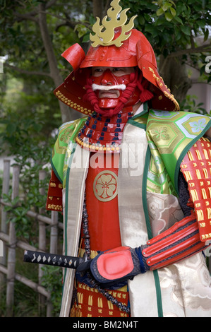 Man wearing warrior costume posing for photos during a festival in Odawara, Japan Stock Photo