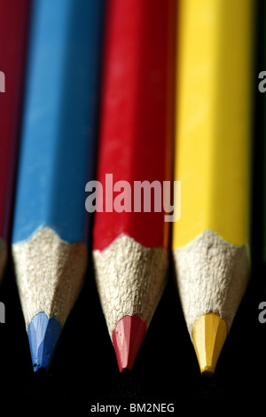 Colorful set three pen in vibrant colors over black background Stock Photo