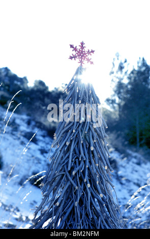 Christmas red star in a snow day. Xtmas card Stock Photo