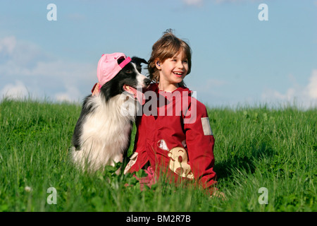 Mädchen mit Border Collie / girl with Border Collie Stock Photo