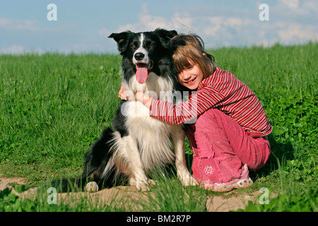 Mädchen mit Border Collie / girl with Border Collie Stock Photo