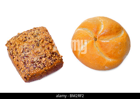 Wholemeal seed roll and bread roll isolated on white Stock Photo