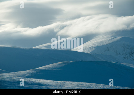 Mist covered Skiddaw from Great Sca fell in the Caldbeck Fells in winter, Lake District, Cumbria, England, UK