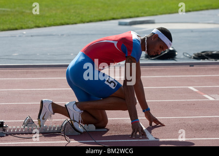 Javier Coulson (PUR) at the start of the 400 meter hurdles at the 2009 Reebok Grand Prix Stock Photo