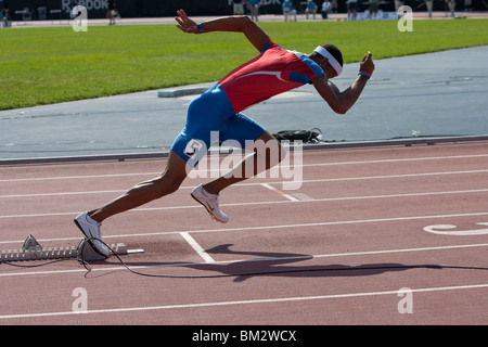 Javier Coulson (PUR) at the start of the 400 meter hurdles at the 2009 Reebok Grand Prix Stock Photo