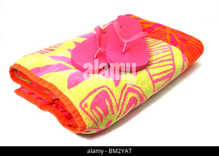 Beach Towel and Flip Flops Stock Photo