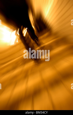 Businessman walking up the stairs blurred motion Stock Photo